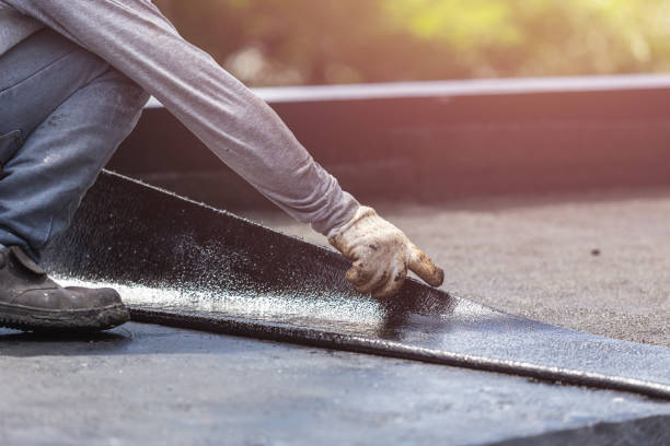 Professional Basement Waterproofing technician working in Tilton, IL